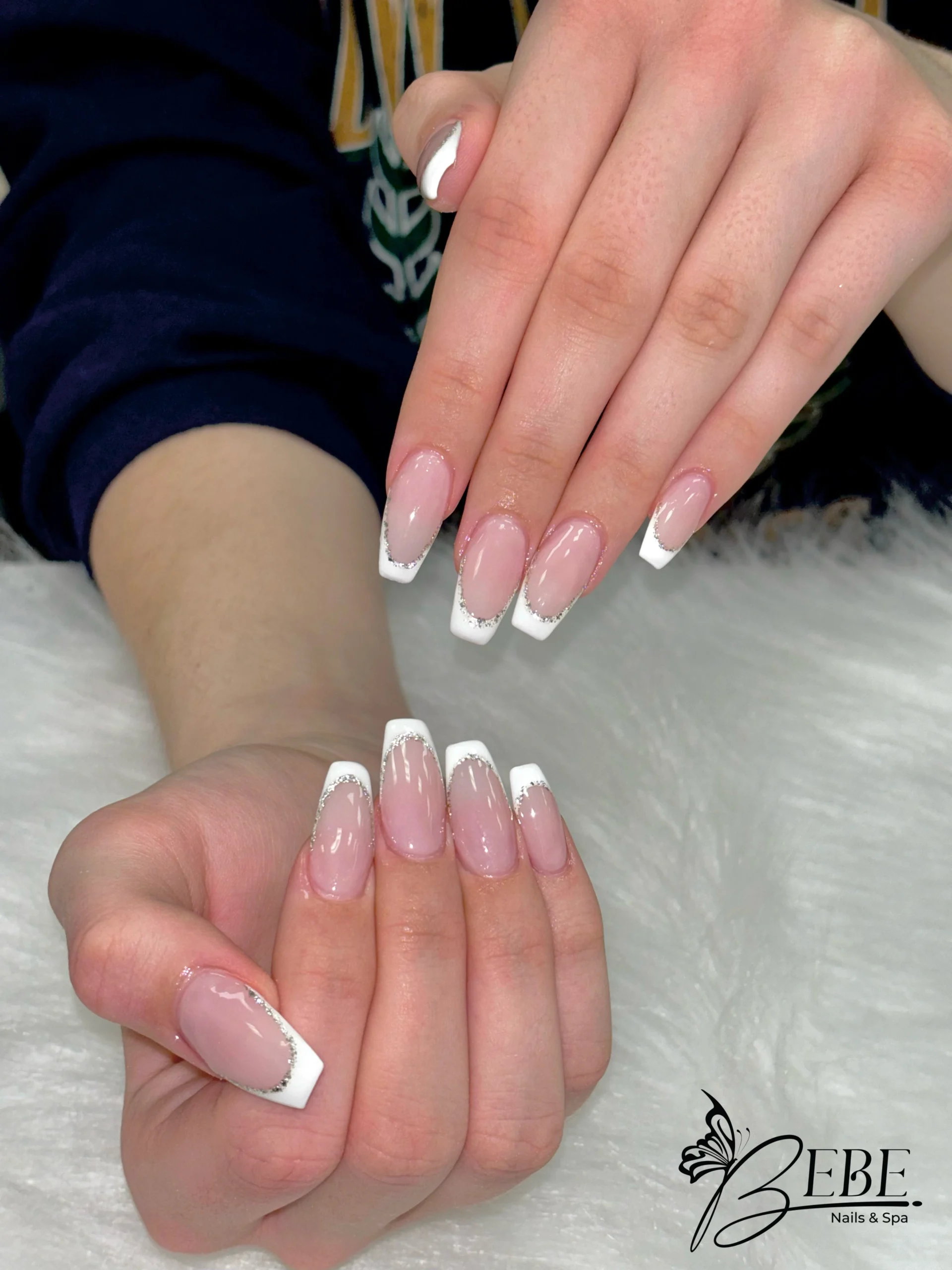 Pastel ombre nails with small rhinestone accents
