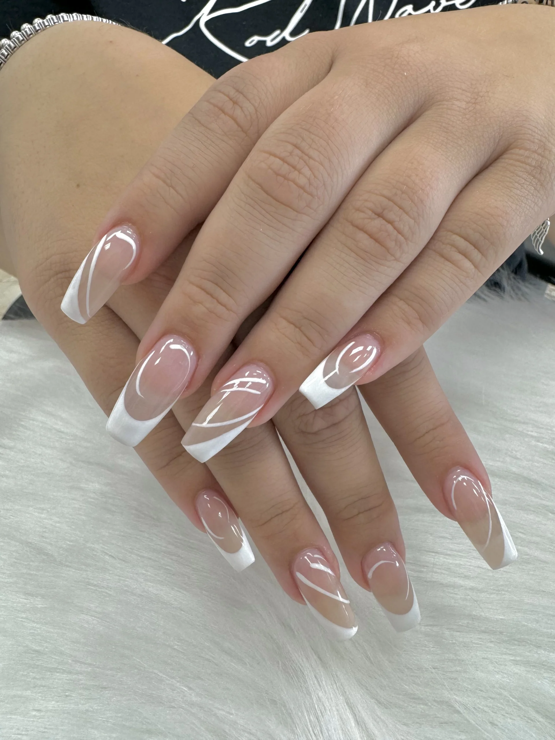 Nails with snowflake art and gold glitter accents