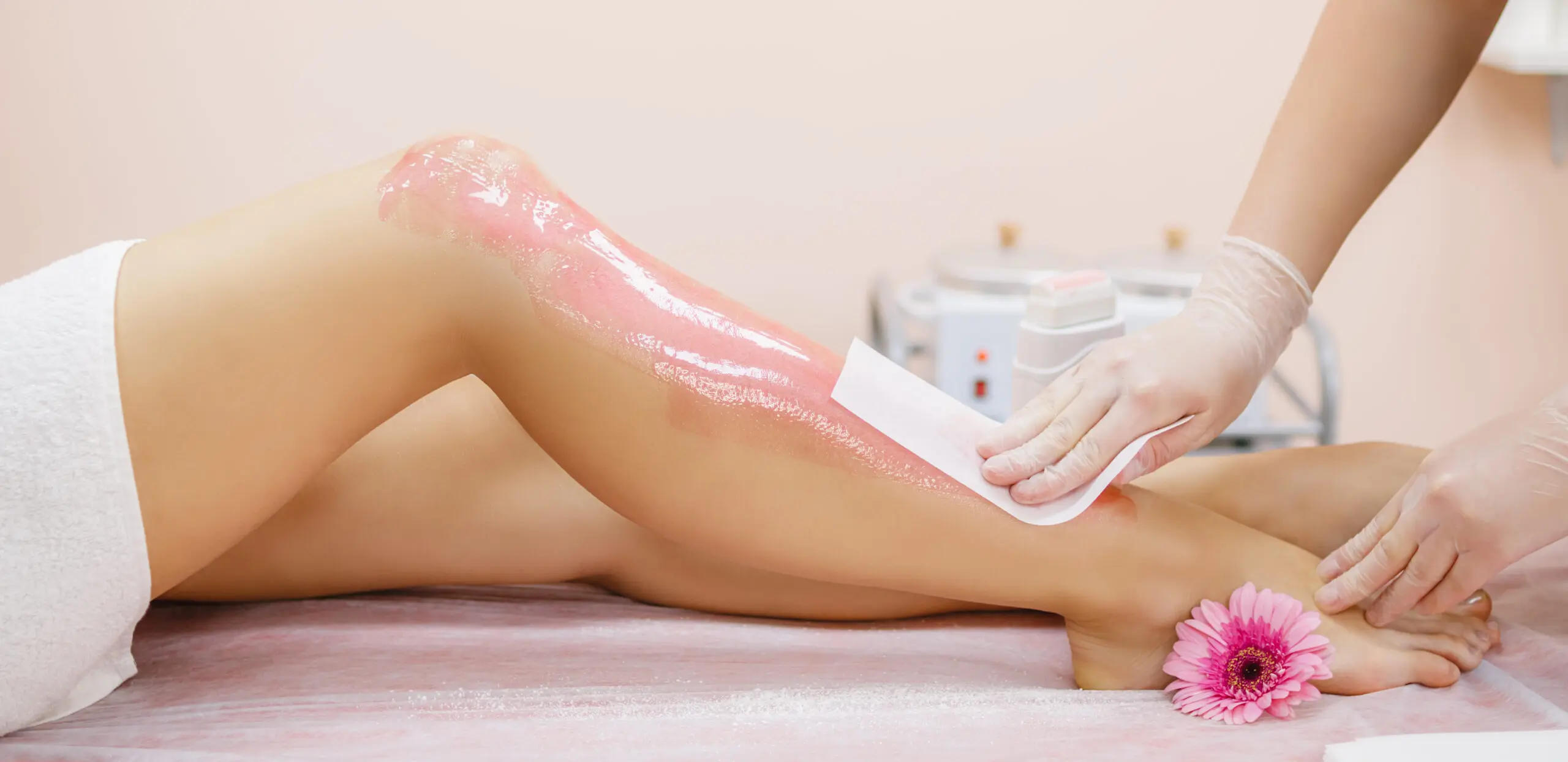 Waxing treatment being carried out on a client at the spa